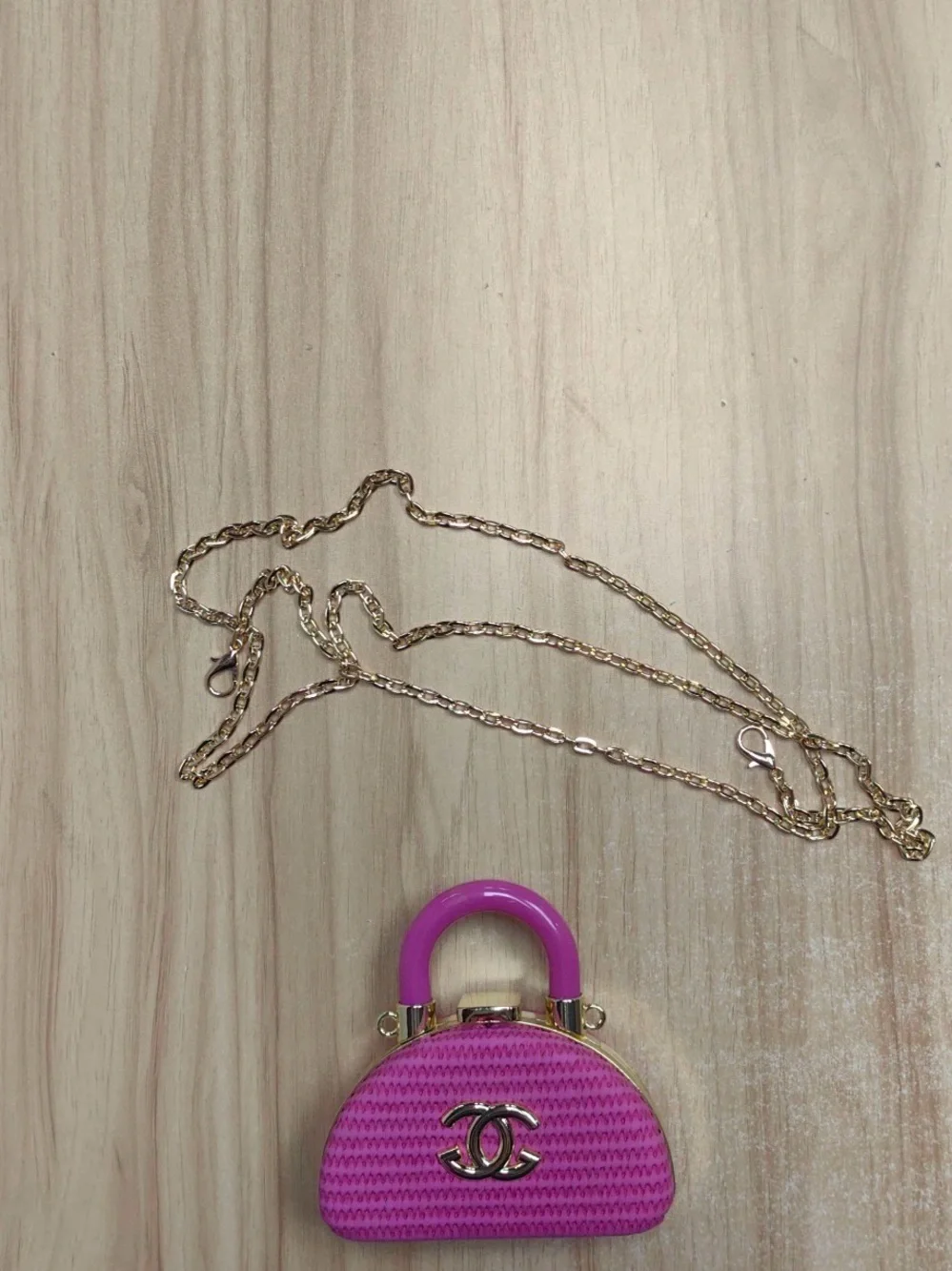 Chic  Pink Mini Dome Crossbody Clutch with Gold Chain.